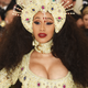 Image for article titled ‘The Universe Do Need Me’: Cardi B Drops Pearls on Pregnancy With Vogue and Lashes Out With Kiss